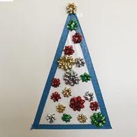 Weihnachtsbaum dekorieren mit Geschenksschleifen Weihnachtsbaum dekorieren mit Geschenksschleifen