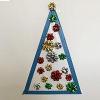 Weihnachtsbaum dekorieren mit Geschenksschleifen