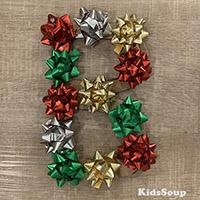 Geschenkschleifen - Buchstaben formen Geschenkschleifen - Buchstaben formen